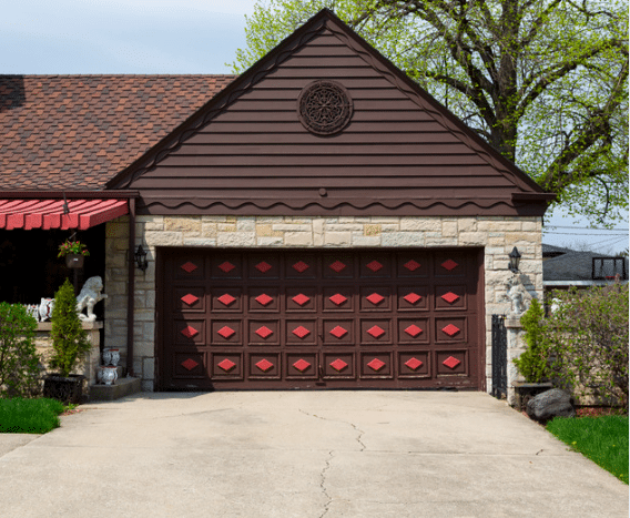 Decorative steel garage door cover